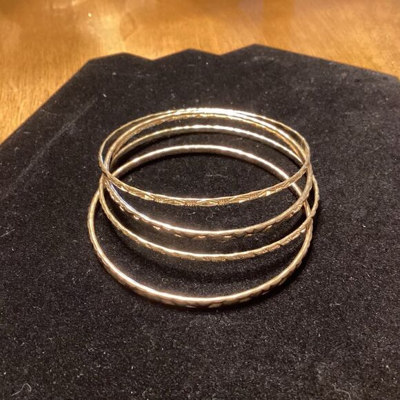Set of 4 Textured Goldtone Bangle Bracelets - Picture 1 of 6